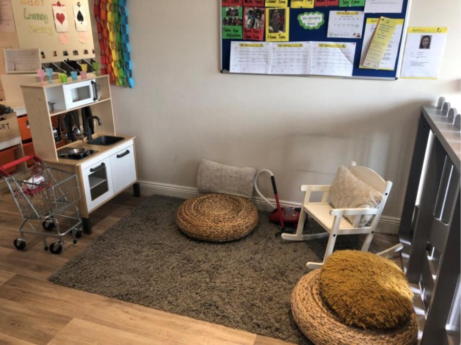 High Care Childcare, Ballincollig, County Cork. – After: room with natural colour floor and neutral colour walls and furniture.