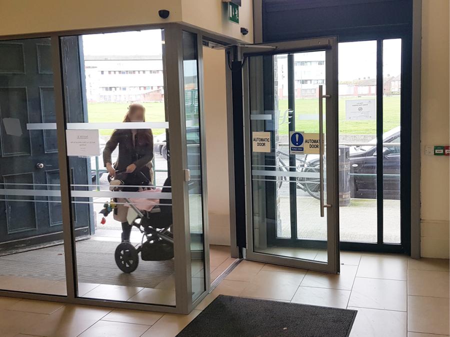 Power operated door providing easy access for person with buggy