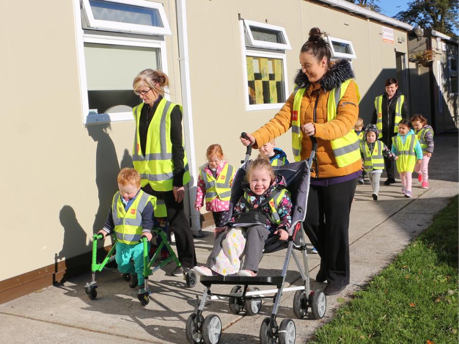 Children of all abilities enjoying the outdoors, Graiguecullen Parish Childcare Centre, County Laois.